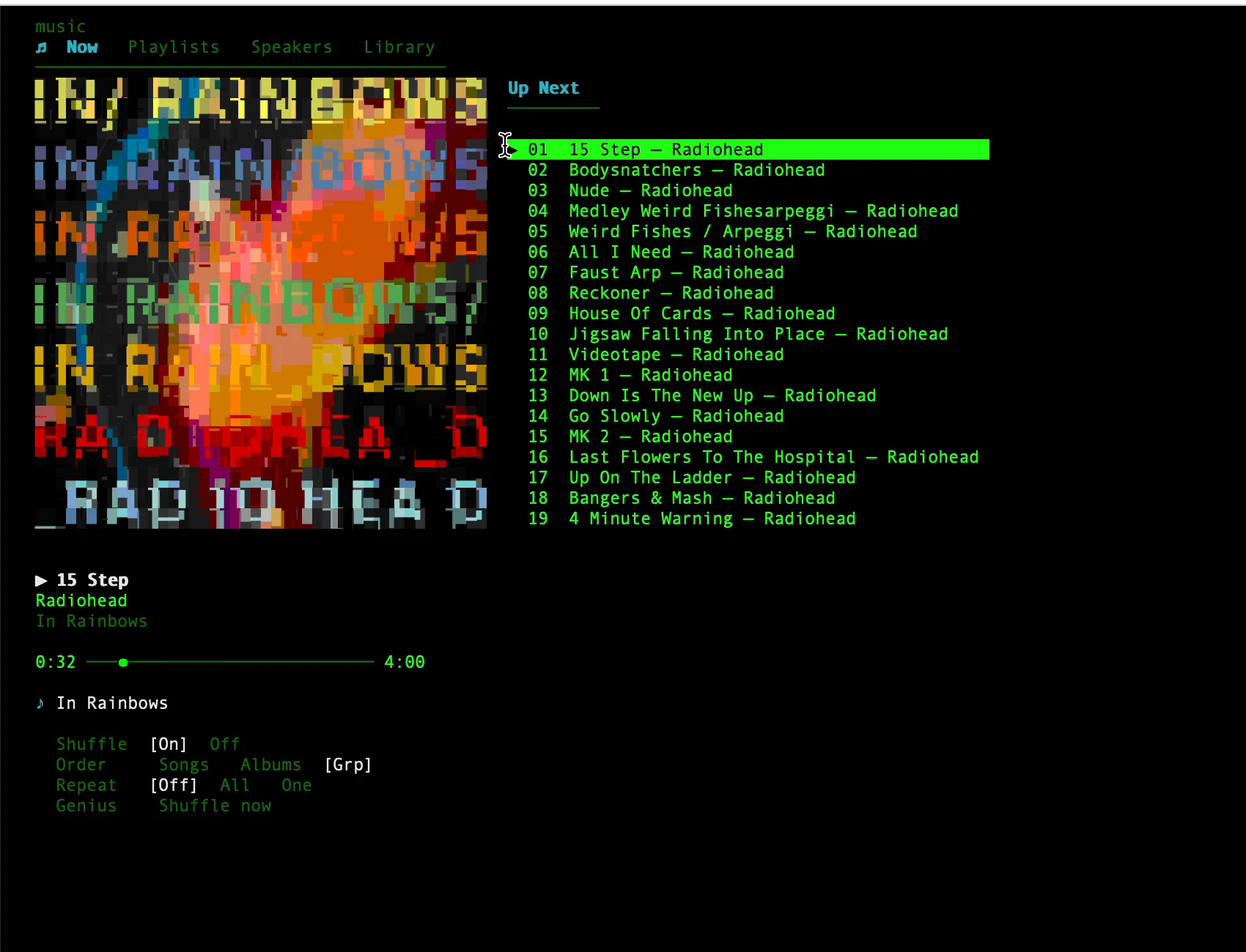 Now Playing tab: album art, Up Next queue, playback controls